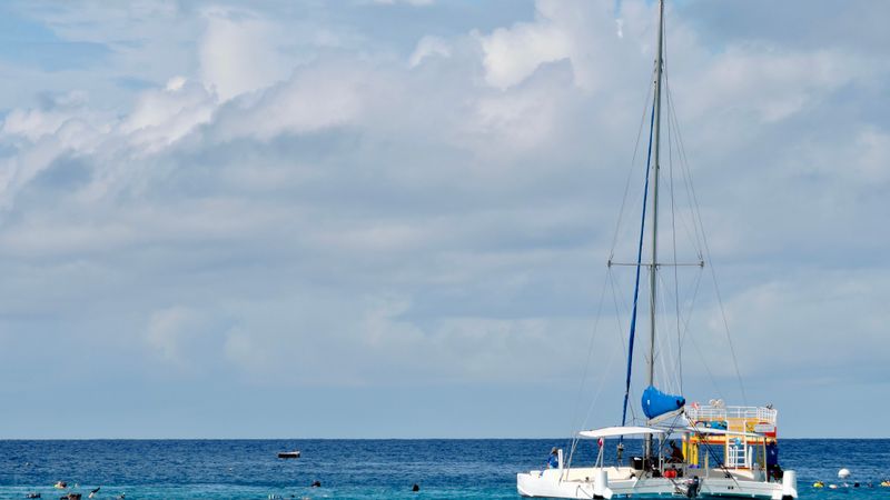 Catamaran on turquoise Caribbean water