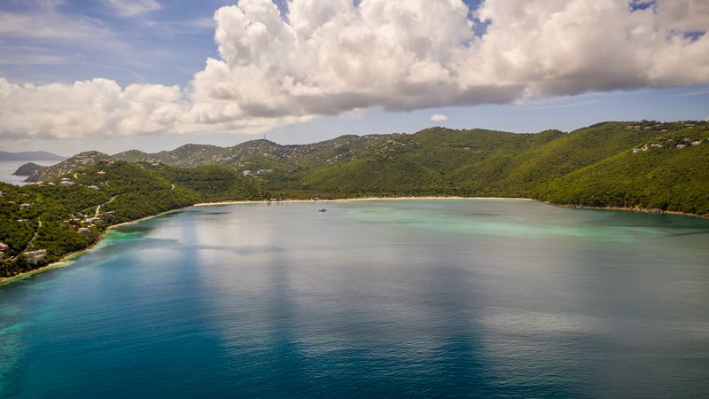Coastline with green mountains and clear blue sea, St. Thomas